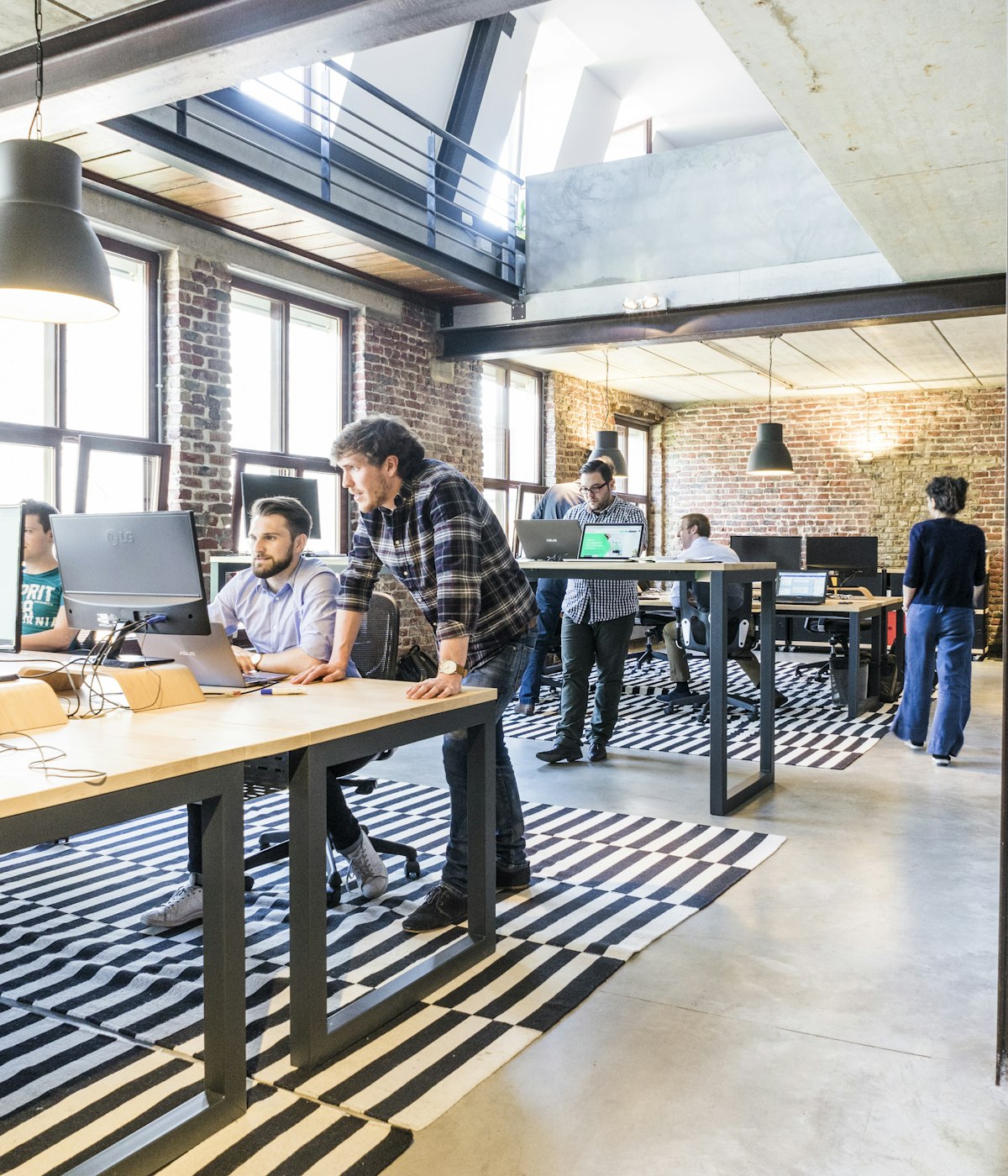 Startup founders reviewing growth strategy